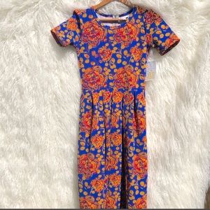 Gold print flowers on a blue Lularoe Amelia dress